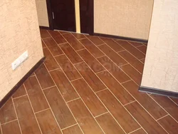 Tiles from bathtub to hallway photo