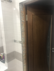 Bathroom Door Made Of Tiles Photo