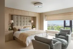 Bedroom interiors with bed and wardrobe photo