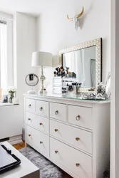 Chest of drawers on the wall in the bedroom photo