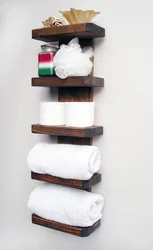 Bathroom shelf for towels photo