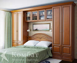 Bedroom wall with bed photo