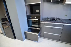 Straight kitchen with dishwasher photo