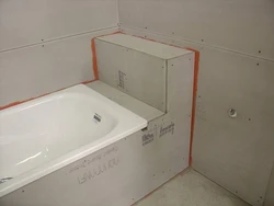 Bathtub in a plasterboard box photo