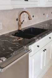 Kitchen with black marble countertop photo