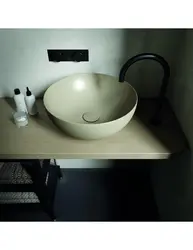 Bowl on the countertop in the bathroom photo