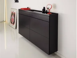 Shoe rack as a chest of drawers in the hallway photo