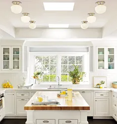 Window design in a white kitchen photo