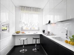 Window design in a white kitchen photo