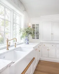 Window design in a white kitchen photo