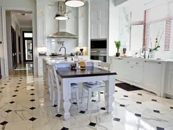 Porcelain tile floor photo in a white kitchen