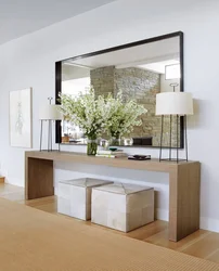 Mirror with table in the hallway photo