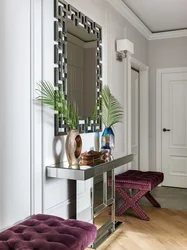 Mirror with table in the hallway photo