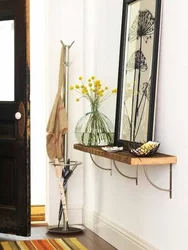 Mirror with table in the hallway photo