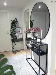 Mirror with table in the hallway photo