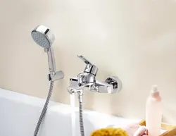 Bathtub And Faucets With Long Photo