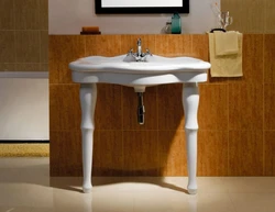 Sink with legs for bathroom photo