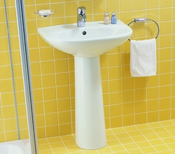 Sink with legs for bathroom photo