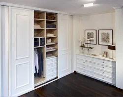 Wardrobe in the bedroom chest of drawers photo