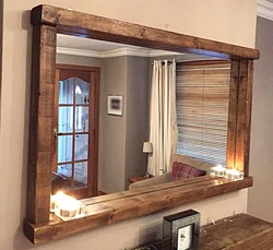Wooden bathroom mirror photo