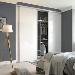 Gray and white wardrobe in the bedroom photo