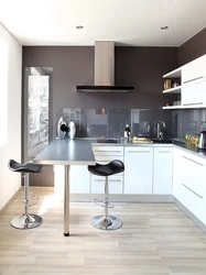 Gray kitchen with breakfast bar photo