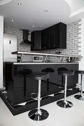 Gray kitchen with breakfast bar photo