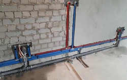 Pipes In The Floor In The Bathroom Photo