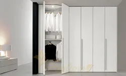 White hinged wardrobes in the hallway photo