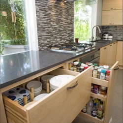 Cabinet on the countertop in the kitchen photo