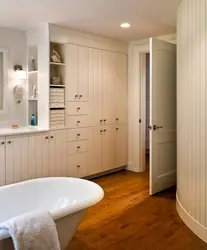 Tall cabinet in the bathroom photo