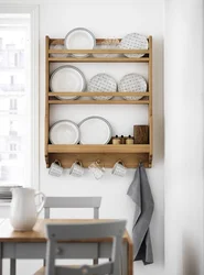 Shelves for dishes in the kitchen photo