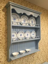 Shelves for dishes in the kitchen photo