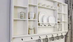 Shelves for dishes in the kitchen photo