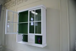 Photo of a kitchen shelf with doors