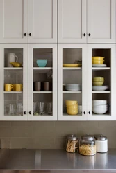Photo of a kitchen shelf with doors