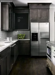 Gray kitchen with black refrigerator photo