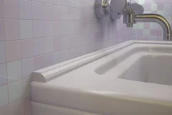 Tile border in the bathroom photo
