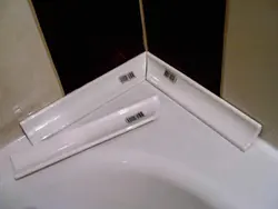 Tile border in the bathroom photo