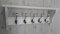 Hooks on the wall in the hallway photo