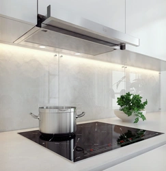 White kitchen with built-in hood photo
