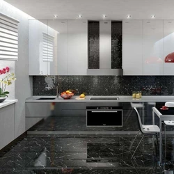 White kitchen on black tiles photo