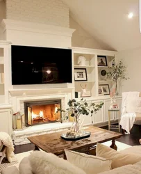 Light fireplace in the living room interior photo