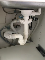 Washing machine draining into bathtub photo