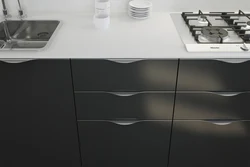 Kitchen with black end handles photo
