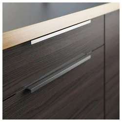 Black handles on kitchen facades photo