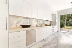 White marble tiles in the kitchen photo