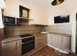 White kitchen with dark wood photo