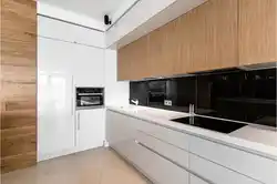 White kitchen with dark wood photo