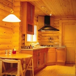 Hood for the kitchen of a wooden house photo